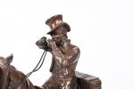 Gaston d'ILLIERS (1876-1932). "Le postillon allumant sa pipe", Bronze à...