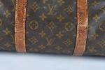 LOUIS VUITTON - Sac "Keepall" en toile Monogram et cuir...