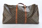 LOUIS VUITTON - Sac "Keepall" en toile Monogram et cuir...