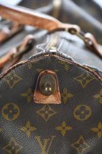 LOUIS VUITTON - Sac "Keepall" en toile Monogram et cuir...