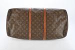 LOUIS VUITTON - Sac "Keepall" en toile Monogram et cuir...