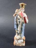 Trois sujets religieux : Vierge à l'Enfant en terre cuite...